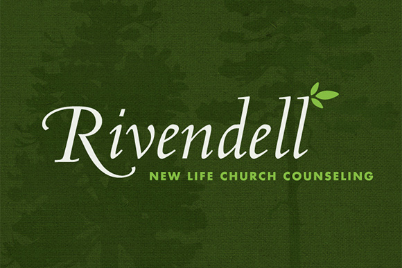 Rivendell mark over tree motif signage